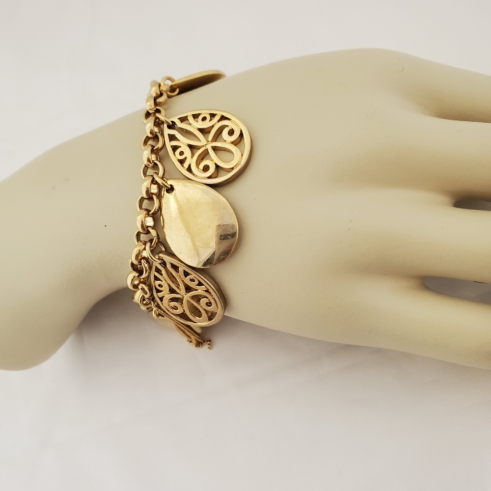 GOLD TONE CHARM BRACELET